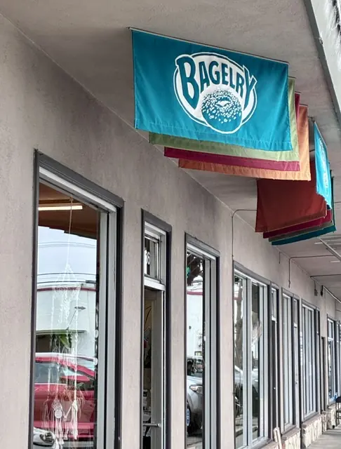 The Bagelry and local business storefronts at Seabright Plaza